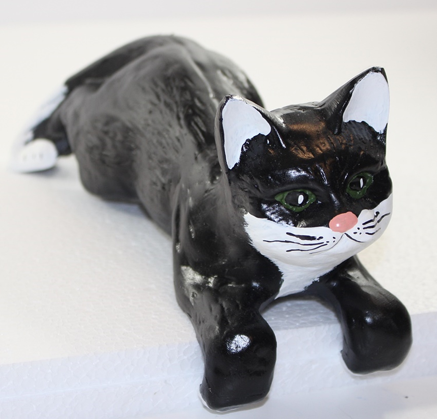 Dekofigur schwarze Katze liegend H 13 cm L 29 cm Katzenfigur Tierfigur aus Kunstharz
