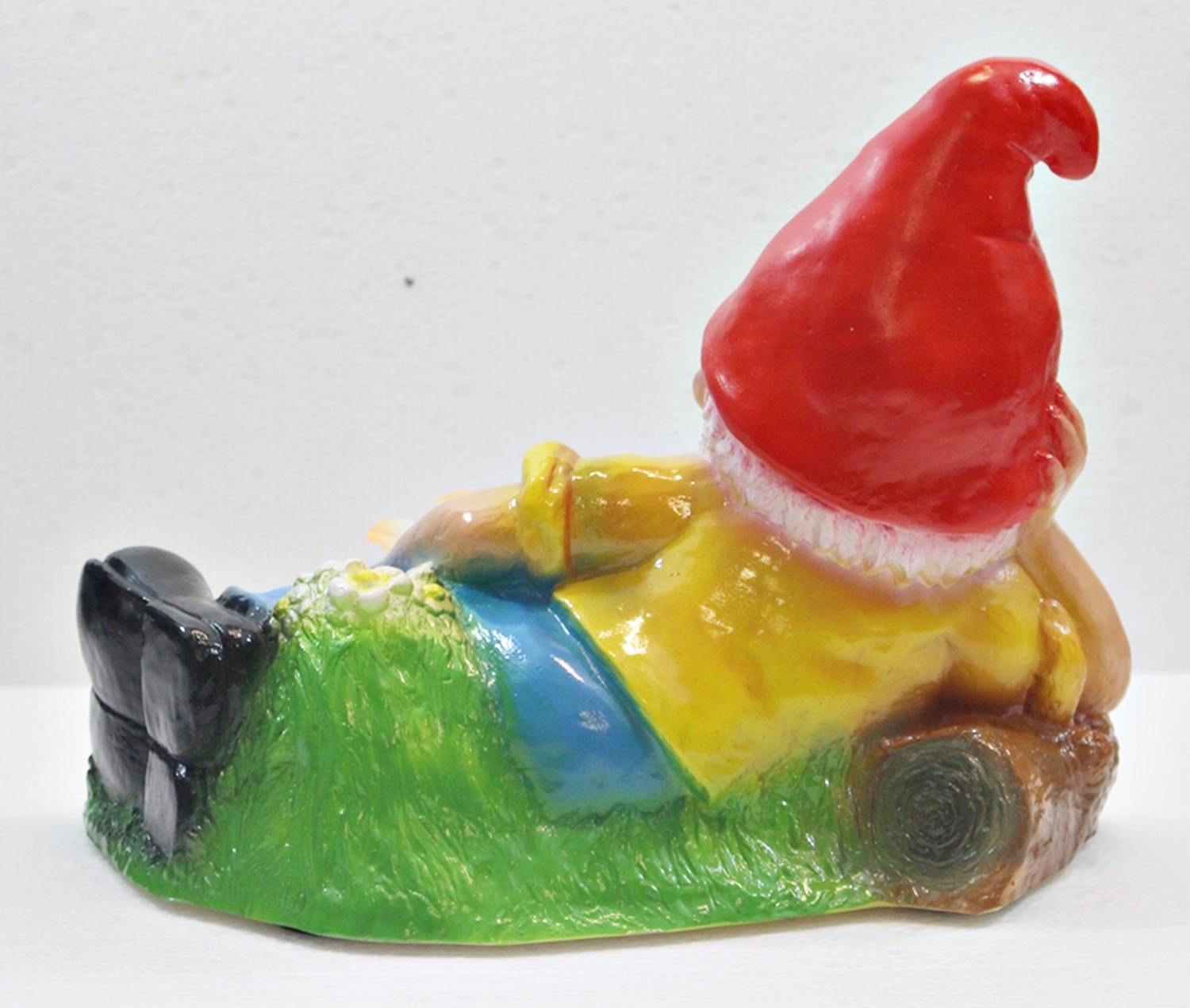 Gartenzwerg liegend mit Blume H 21 cm  Bewegungsmelder Pfiff Pfeifen Figur Zwerg aus Kunststoff