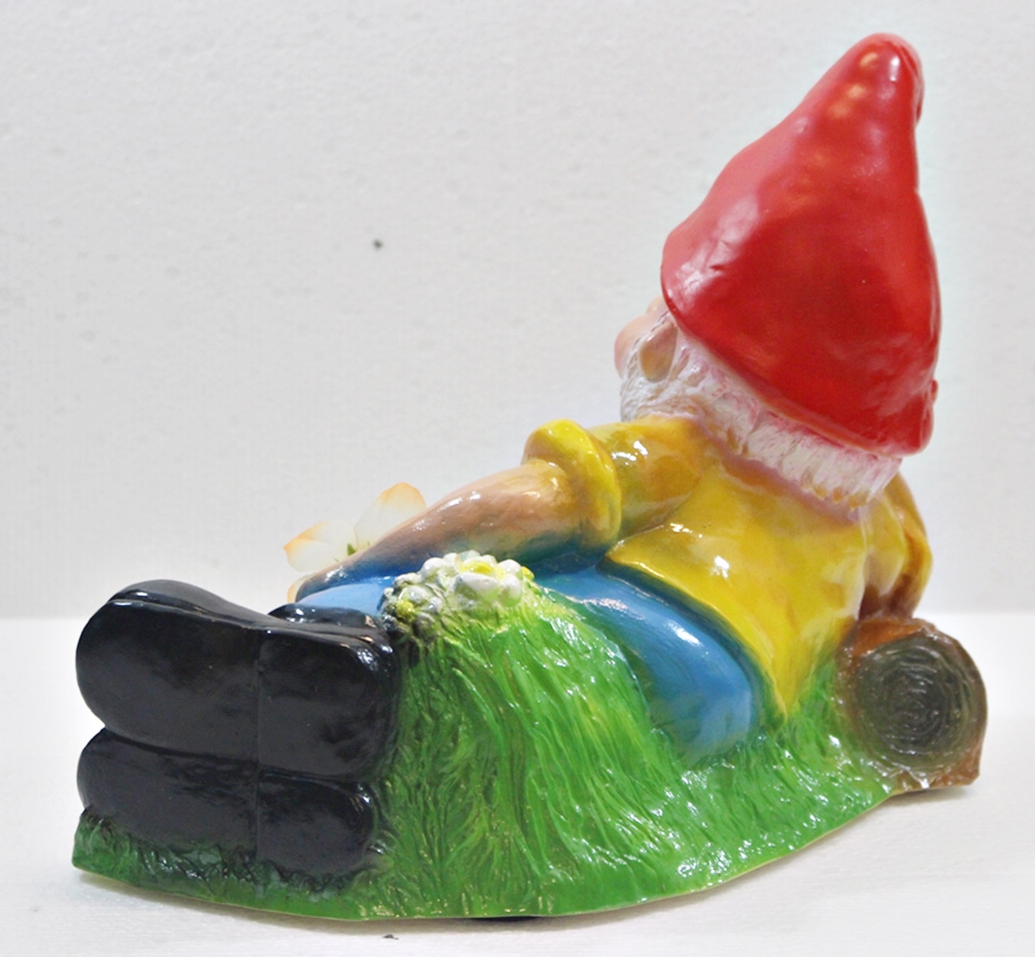 Gartenzwerg liegend mit Blume H 21 cm  Bewegungsmelder Pfiff Pfeifen Figur Zwerg aus Kunststoff