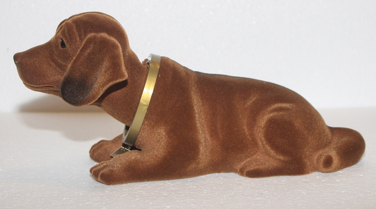 Wackel Dackel Figur Hund Dackel Wackelfigur H 14 cm groß liegend mit Wackelkopf